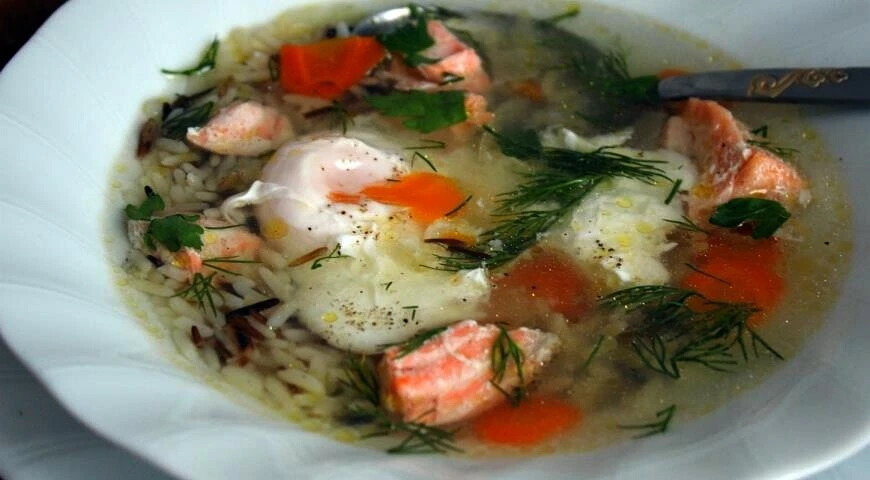 Salmon soup with rice Aquatica mix and poached egg