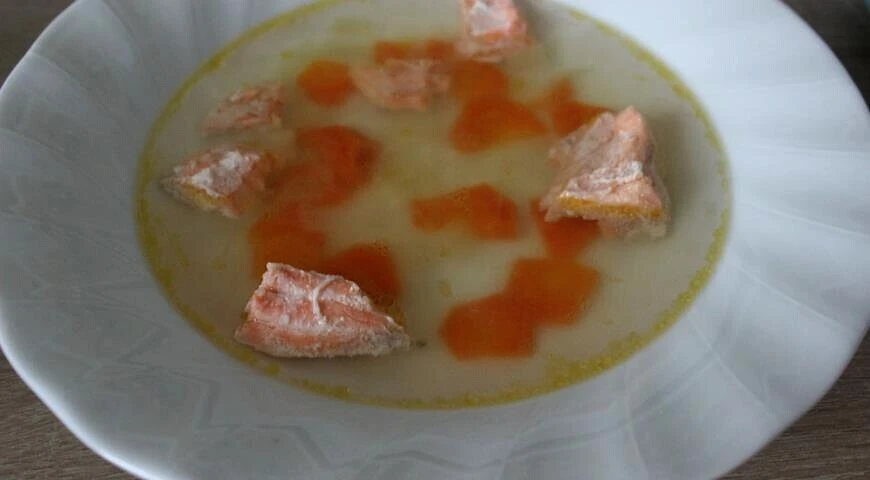 Salmon soup with rice Aquatica mix and poached egg
