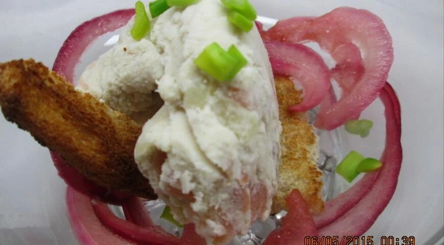 Sandwich with herring ice cream and pickled onions
