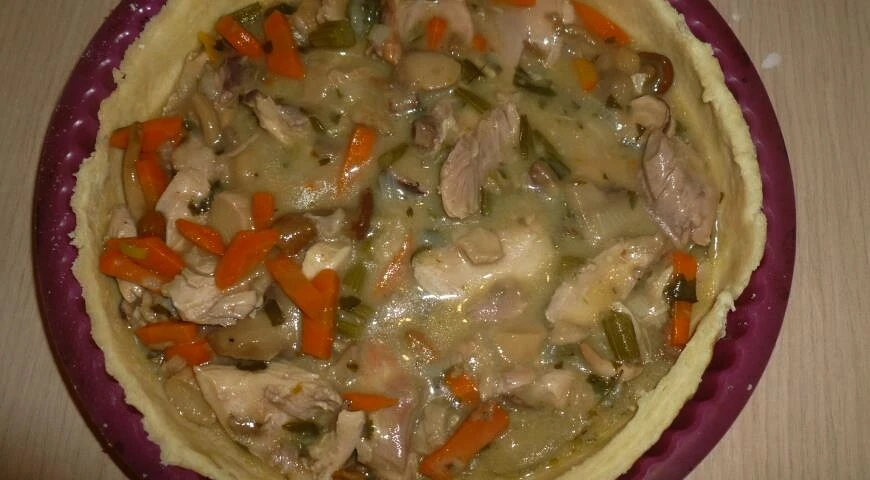 Pie with chicken, forest mushrooms and vegetables