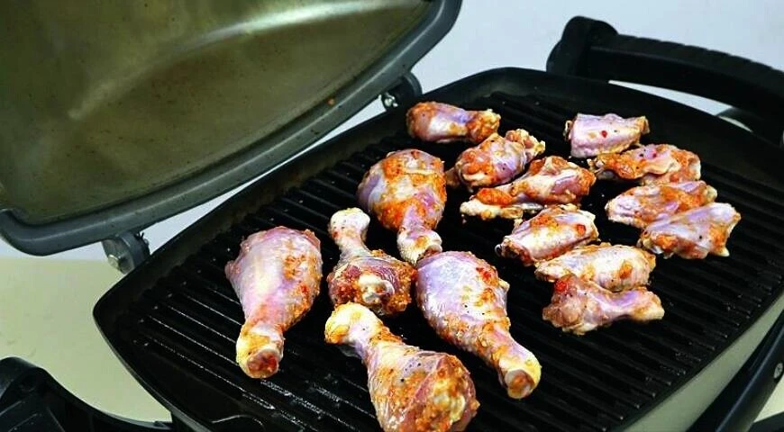 Grilled chicken wings and legs
