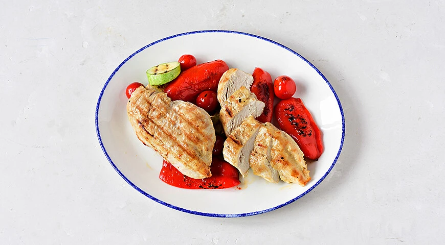 Grilled chicken breast and vegetables with two sauces