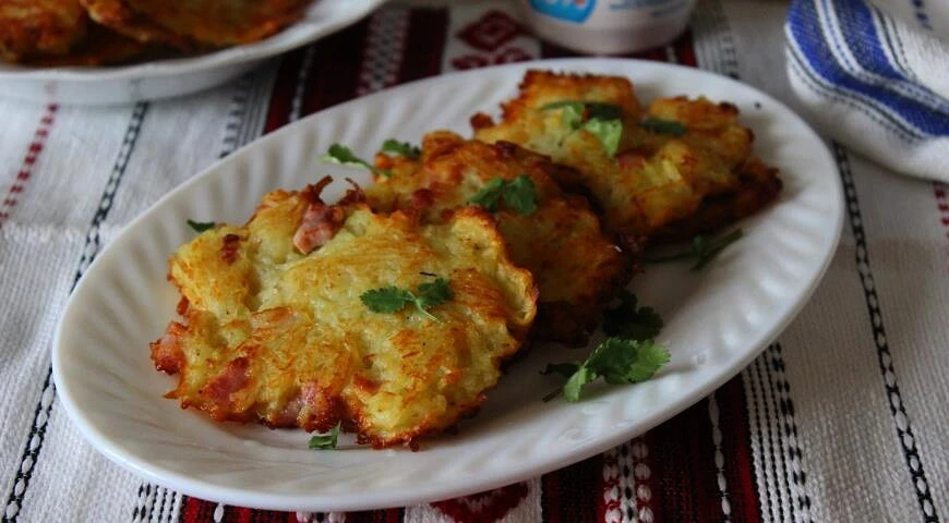 Potato pancakes with bacon and ham