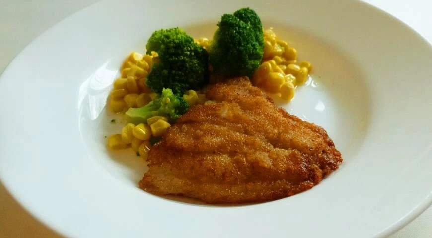 Pangasius with broccoli and corn