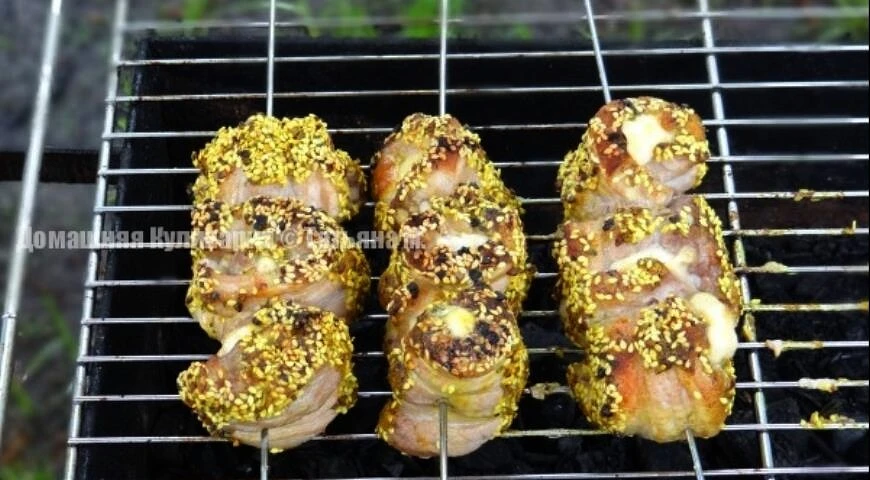Pork skewers with cheese in fragrant golden breading