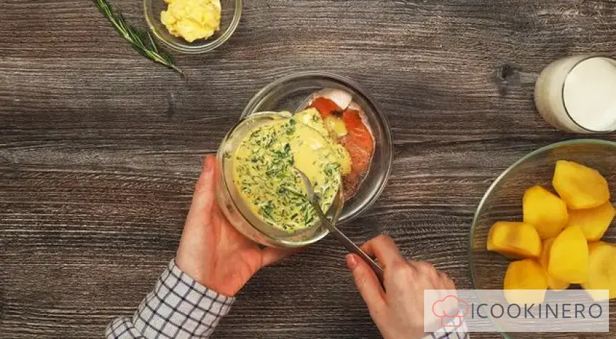 Salmon steak in creamy sauce with potatoes and lemon juice