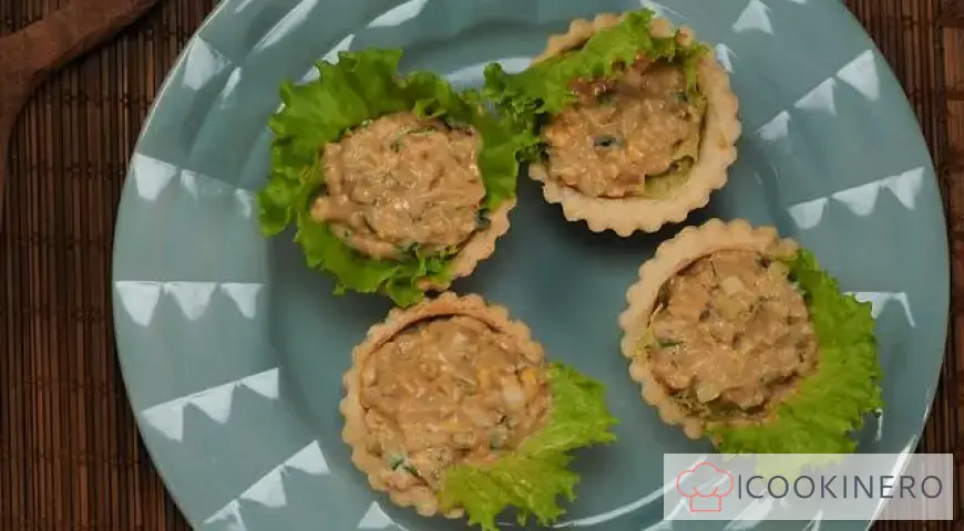 Tartlets with cod liver and cucumber