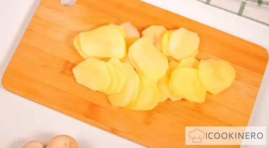 Potato casserole with cheese, chicken and mushrooms