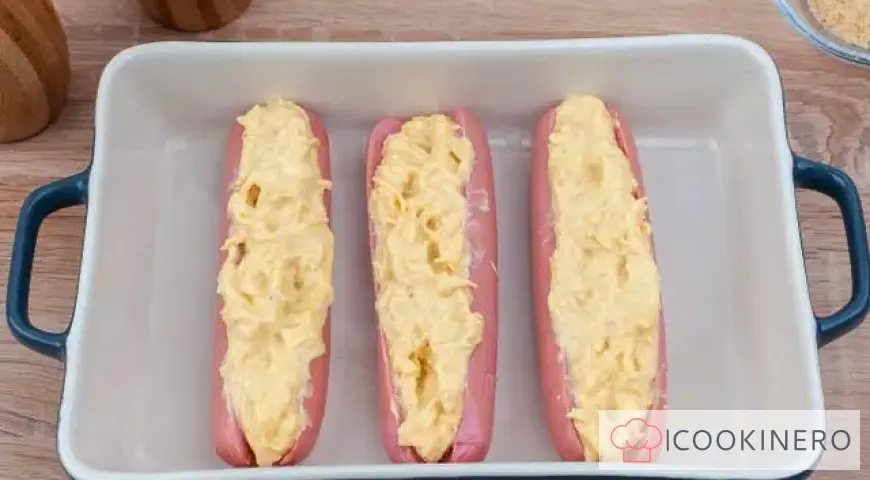 Sausages with cheese in the oven