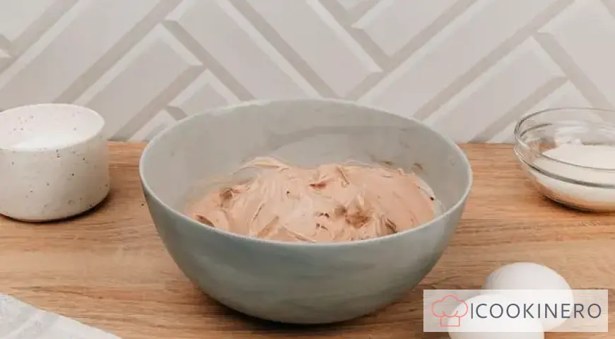 Creamy dessert with meringue, Oreo and nuts