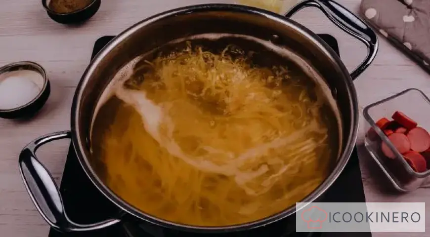 Pasta with sausages in tomato sauce