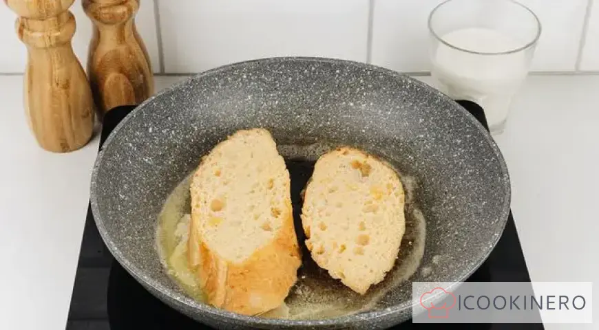French toast with egg and milk in a frying pan
