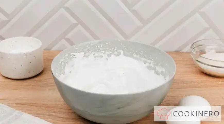 Creamy dessert with meringue, Oreo and nuts