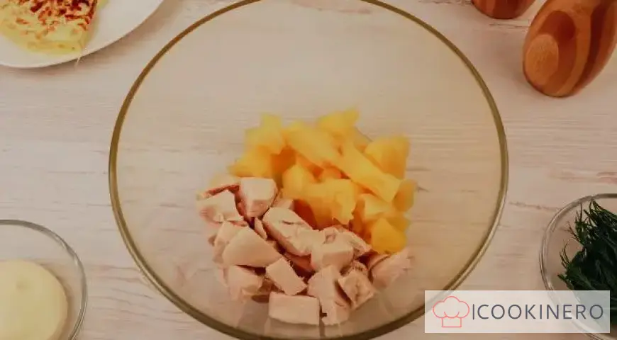 Salad with egg pancakes, chicken and pineapple