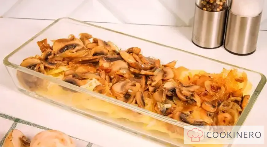 Potato casserole with cheese, chicken and mushrooms