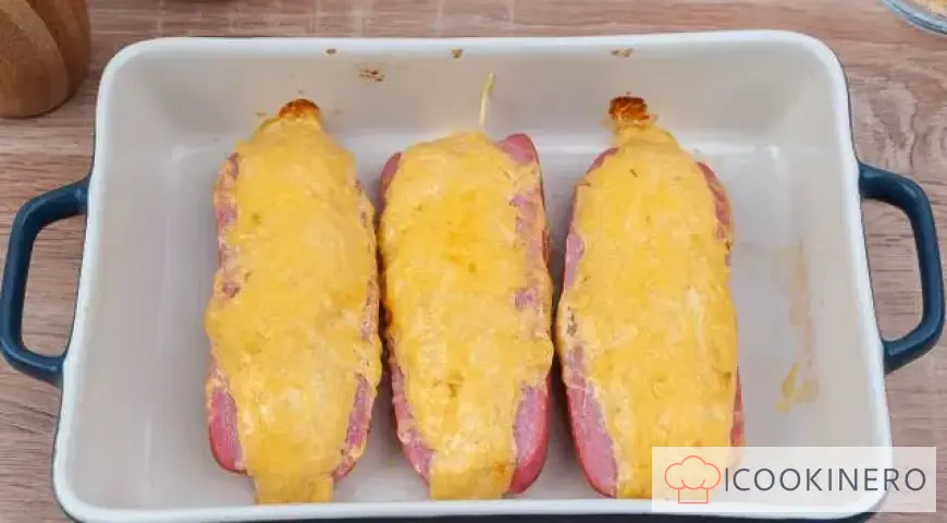 Sausages with cheese in the oven