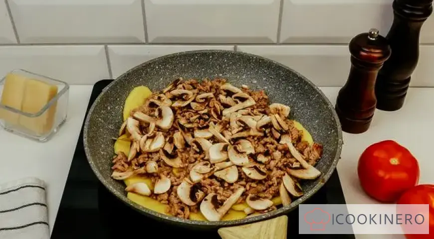 Potato casserole with minced meat in a frying pan