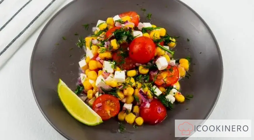 Salad with corn, cherry tomatoes and feta cheese
