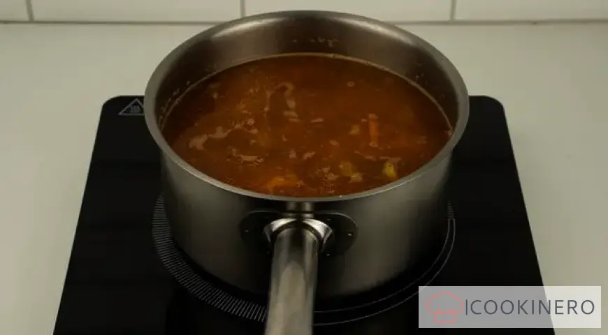Cabbage soup with sprat in tomato sauce