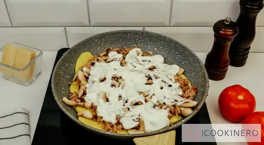Potato casserole with minced meat in a frying pan