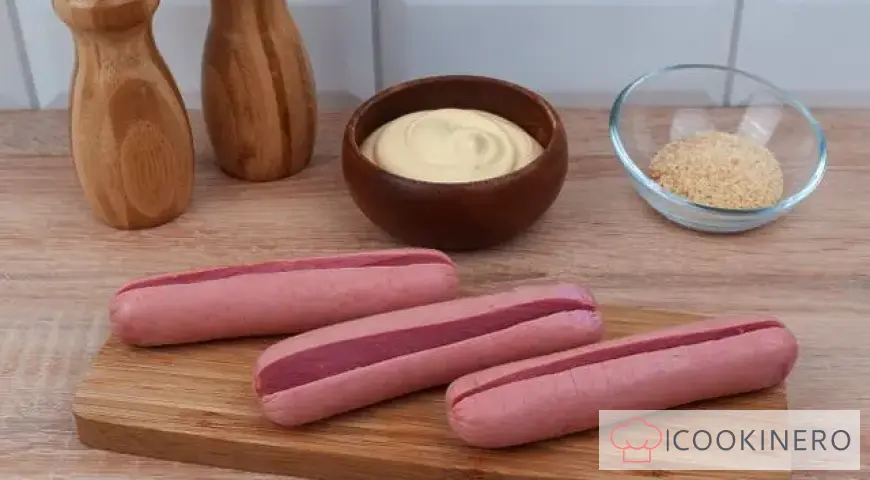 Sausages with cheese in the oven