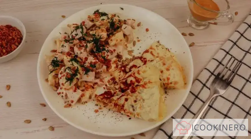 Salad with egg pancakes, chicken and pineapple