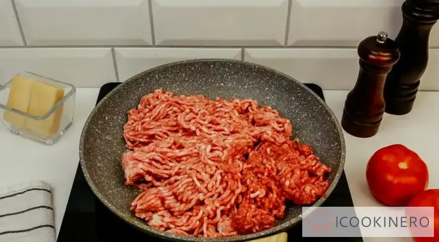 Potato casserole with minced meat in a frying pan