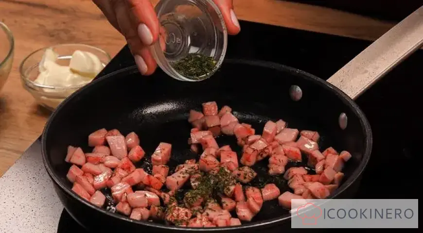 Shawarma from boiled sausage with Chinese cabbage and dried herbs