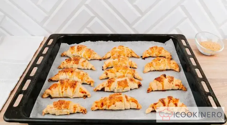 Croissants with condensed milk, cocoa and peanuts