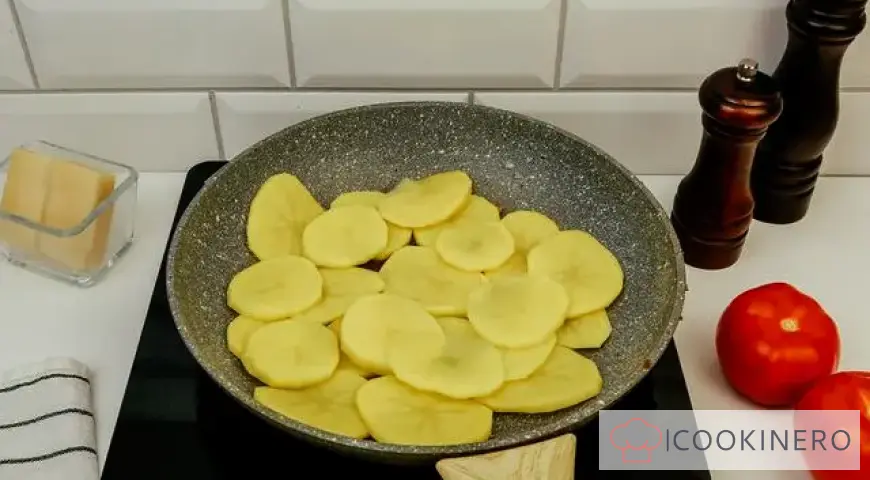 Potato casserole with minced meat in a frying pan