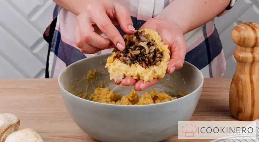 Potato pies with mushrooms