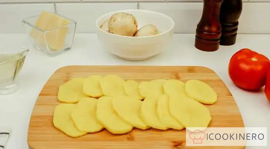 Potato casserole with minced meat in a frying pan