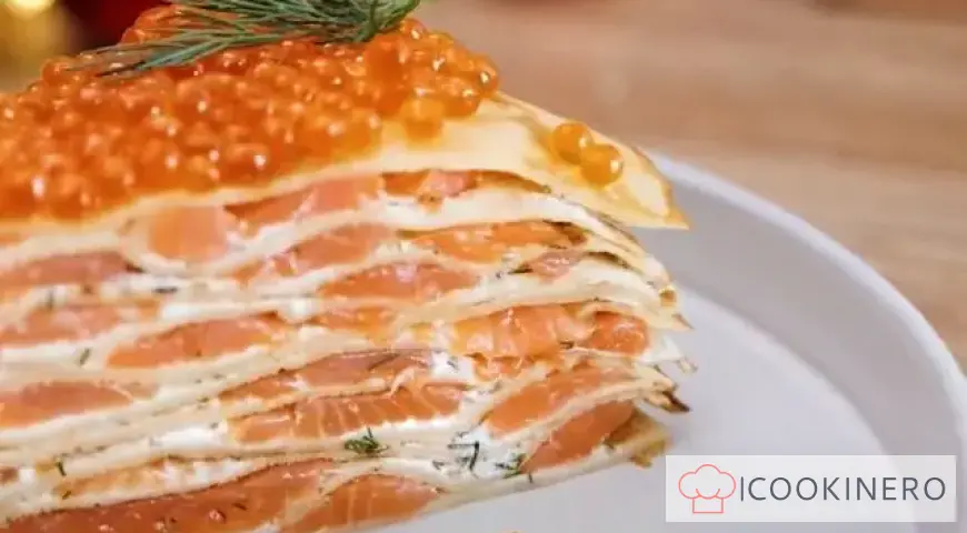 Pancake cake with salmon and herbs