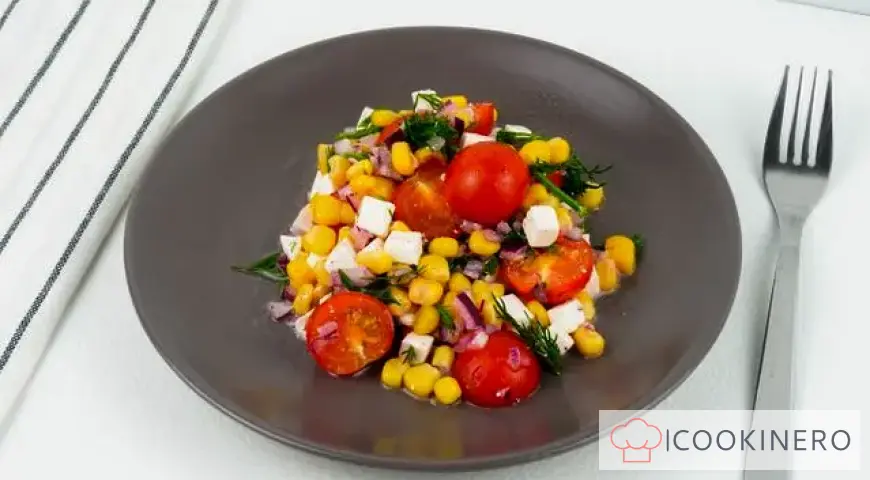 Salad with corn, cherry tomatoes and feta cheese