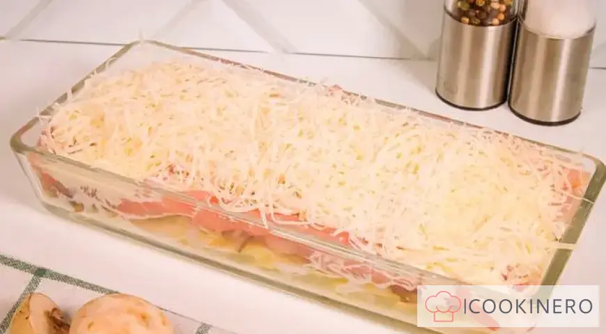 Potato casserole with cheese, chicken and mushrooms