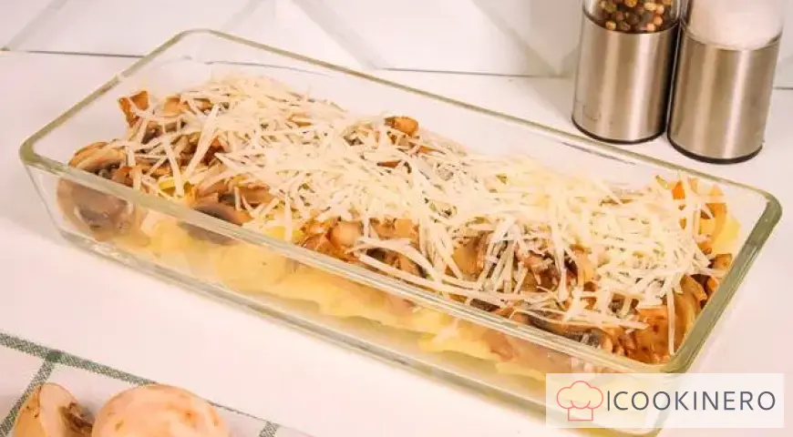 Potato casserole with cheese, chicken and mushrooms
