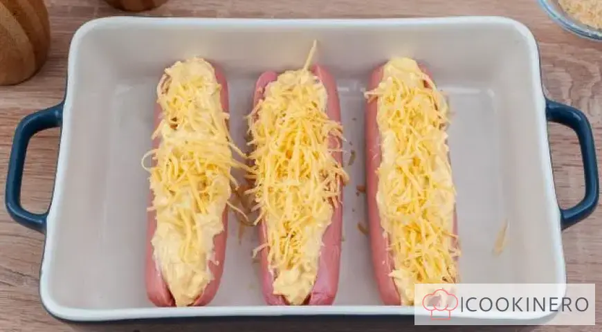 Sausages with cheese in the oven