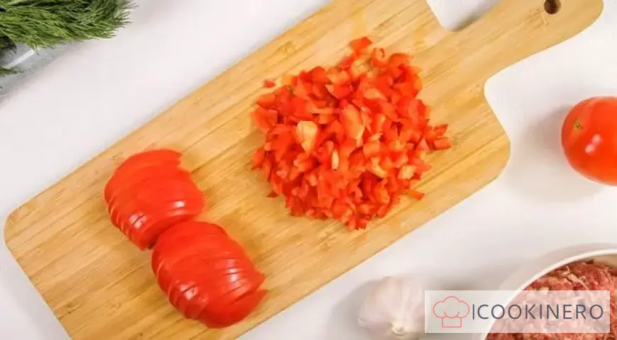 Chevapchichi in bell pepper and tomato sauce