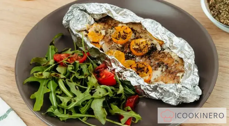 Pollock baked in cream and cherry tomatoes