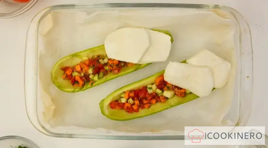 Baked zucchini with tomatoes and herbs
