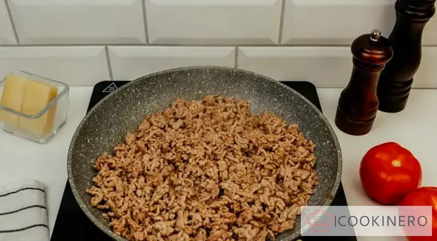 Potato casserole with minced meat in a frying pan