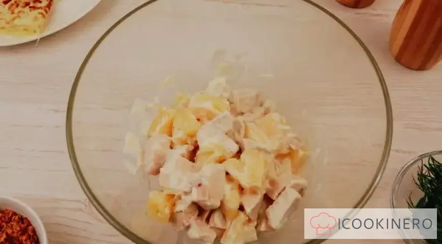 Salad with egg pancakes, chicken and pineapple