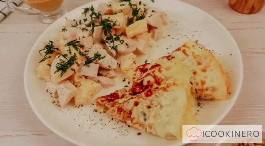 Salad with egg pancakes, chicken and pineapple