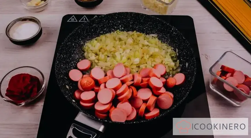 Pasta with sausages in tomato sauce