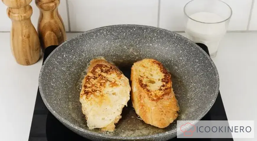 French toast with egg and milk in a frying pan