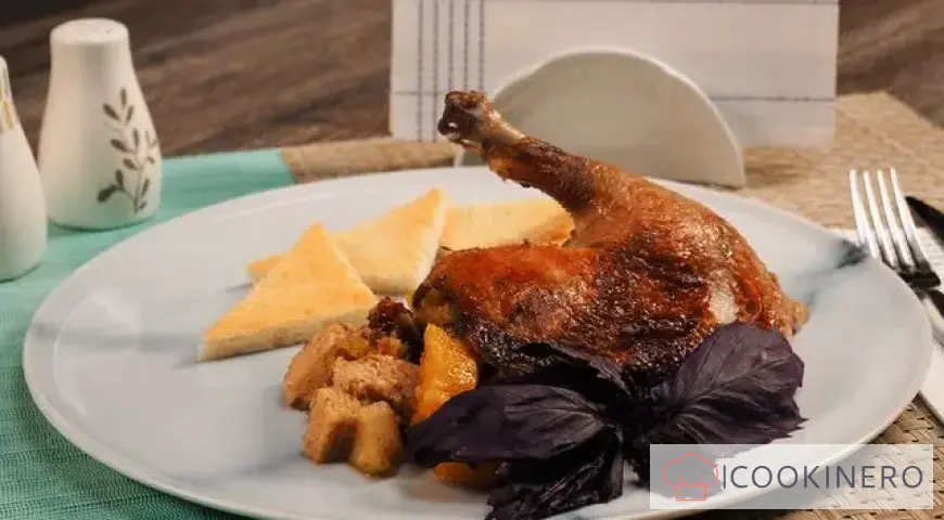 Ente mit Äpfeln und Orangen