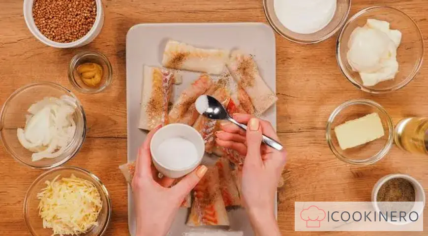 Baked pollock in sour cream with cheese