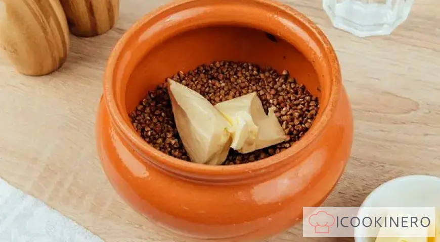 Buckwheat with mushrooms in a pot