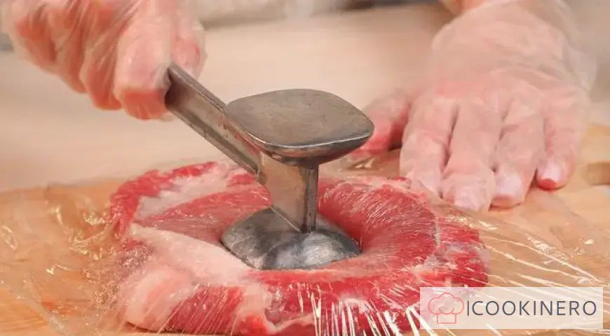 Pork escalope in a frying pan