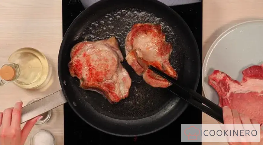 Pork escalope in a frying pan